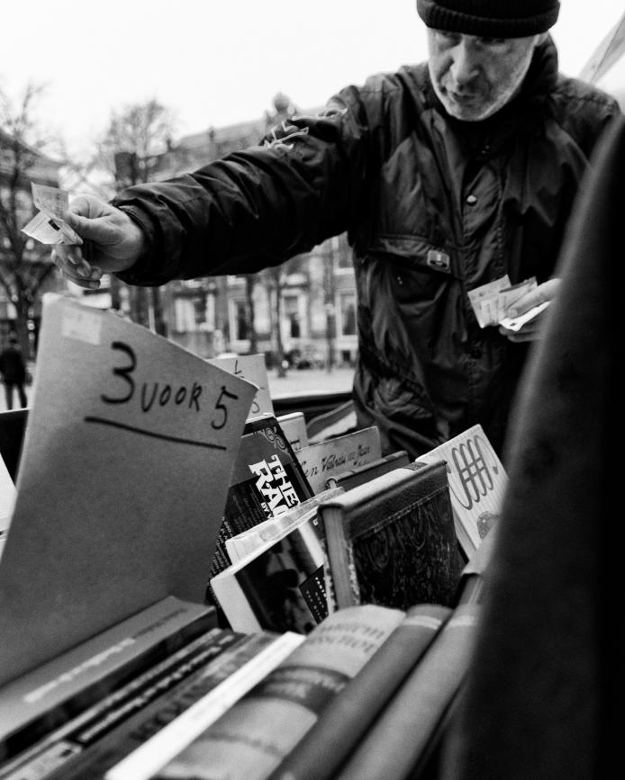 Black-and-white street photograph, city square